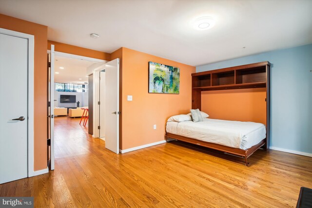 unfurnished bedroom with light hardwood / wood-style flooring