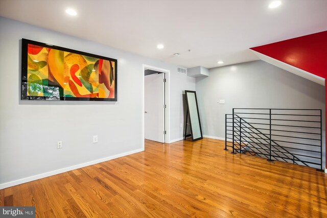 bonus room featuring hardwood / wood-style flooring