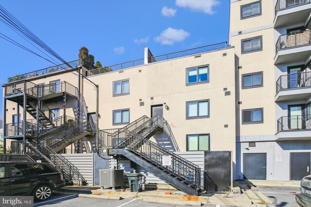 view of building exterior featuring cooling unit