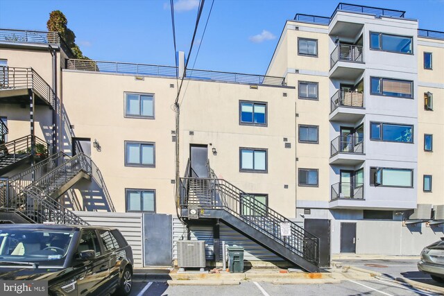 view of building exterior featuring central AC unit