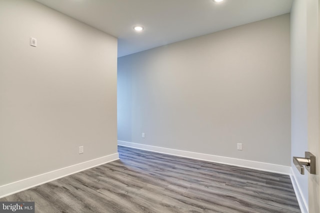 spare room featuring hardwood / wood-style floors