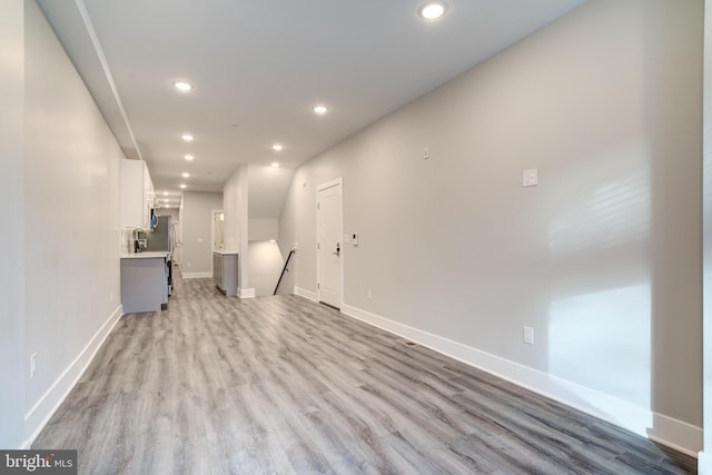 unfurnished living room featuring light hardwood / wood-style flooring