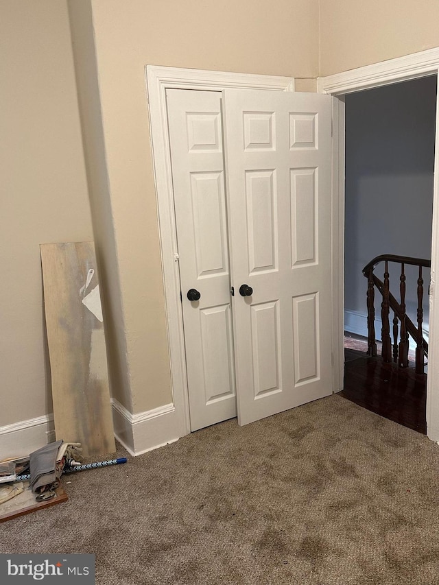 unfurnished bedroom featuring carpet