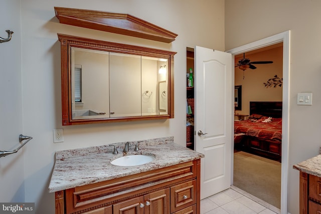 bathroom with vanity, tile patterned flooring, and ceiling fan