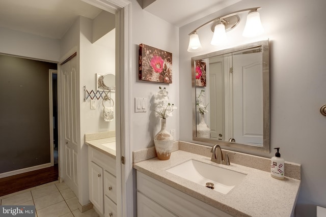 bathroom with vanity and tile patterned floors