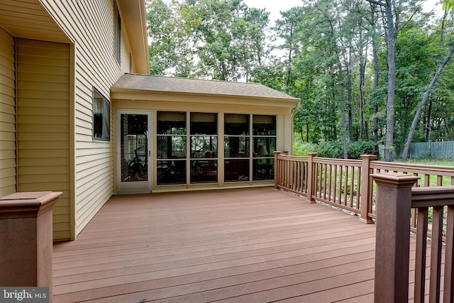 deck with a sunroom