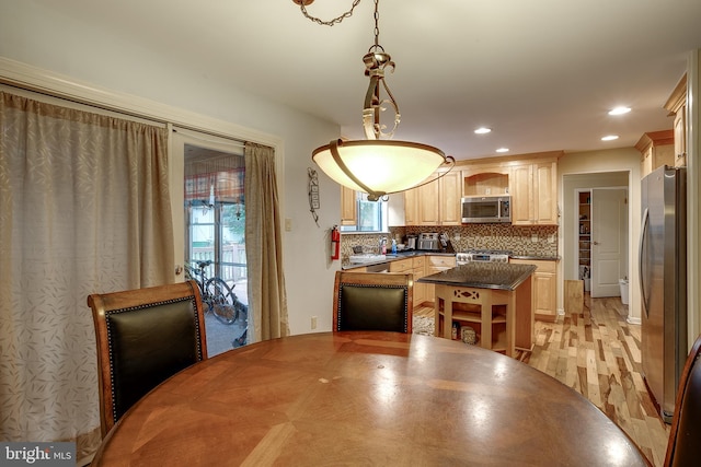 dining space featuring sink