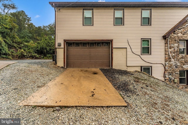 view of front of home with a garage