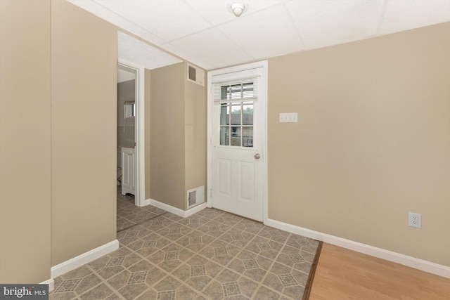 foyer entrance with hardwood / wood-style flooring