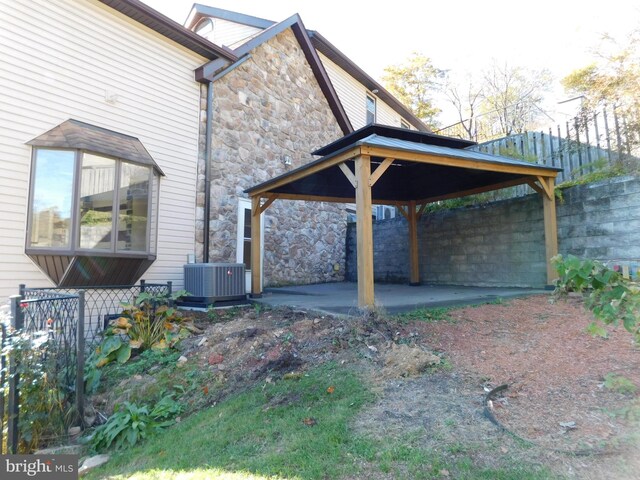 view of side of home with a wooden deck