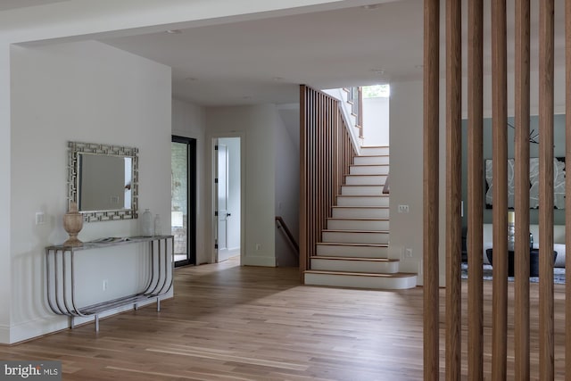 entryway with light hardwood / wood-style floors