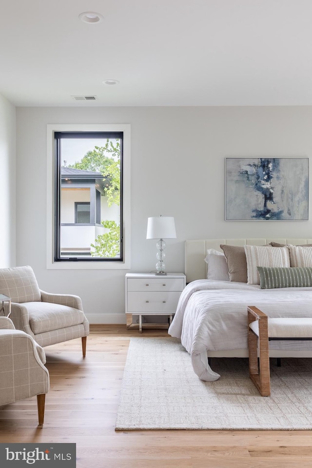 bedroom featuring light hardwood / wood-style flooring