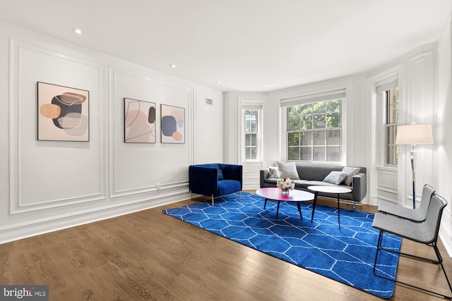 living area featuring hardwood / wood-style flooring