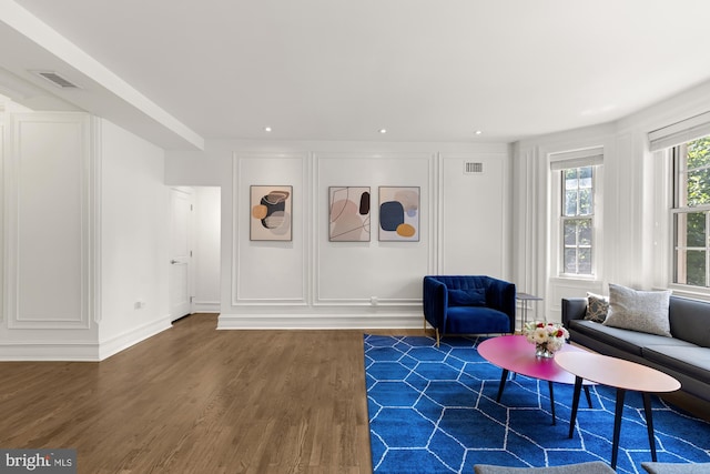 living room featuring dark hardwood / wood-style flooring