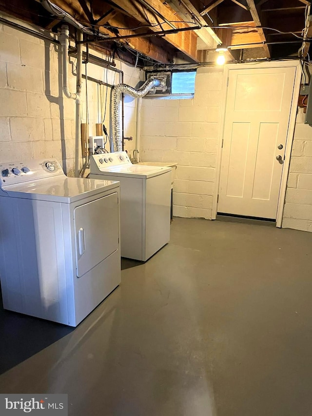 washroom featuring independent washer and dryer