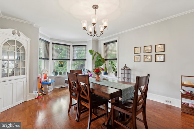 dining space featuring crown molding, plenty of natural light, and dark wood-type flooring