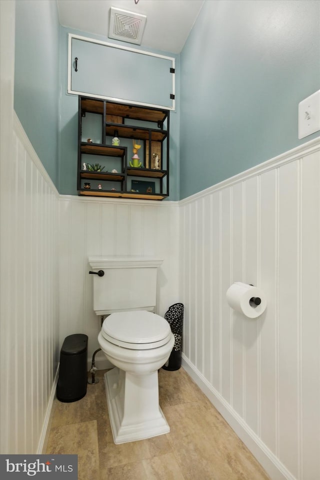 bathroom featuring toilet