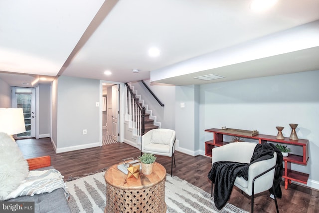 living room with dark wood-type flooring