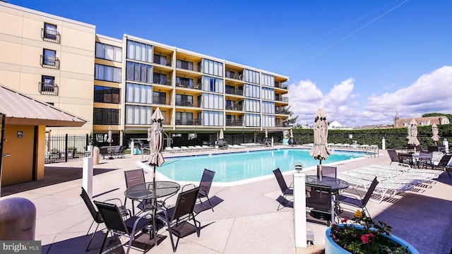 view of pool with a patio area