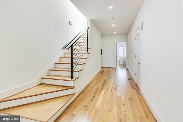 foyer entrance featuring hardwood / wood-style flooring