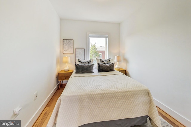 bedroom featuring hardwood / wood-style floors