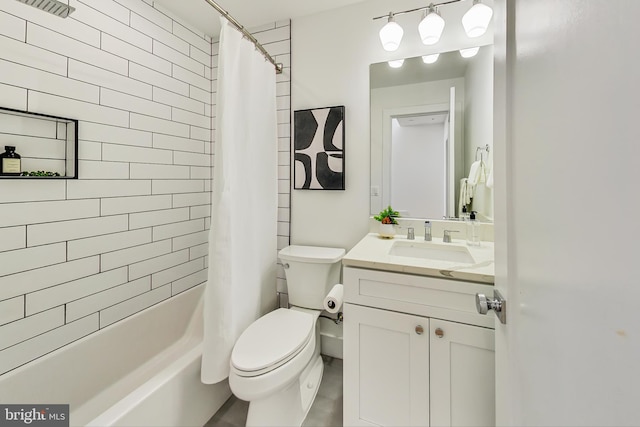 full bathroom featuring vanity, shower / bath combo with shower curtain, and toilet