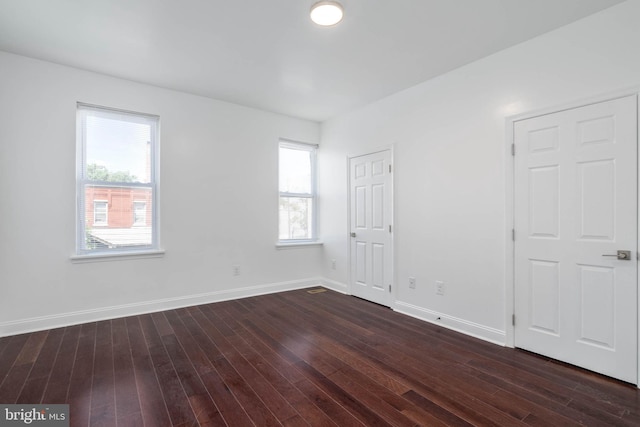 interior space with dark hardwood / wood-style flooring