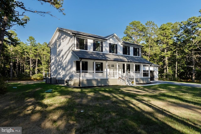 view of front of house with a front lawn and a porch