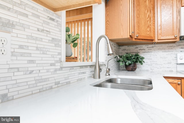 kitchen with sink and backsplash