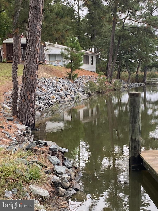 view of dock featuring a water view