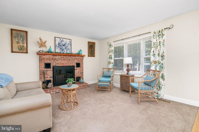 carpeted living room with a brick fireplace