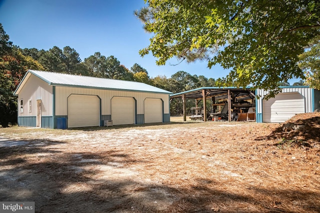 garage featuring a carport