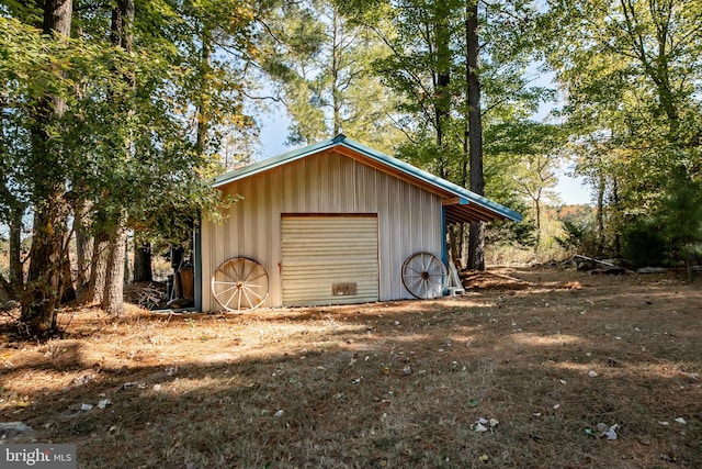 view of outbuilding featuring a garage