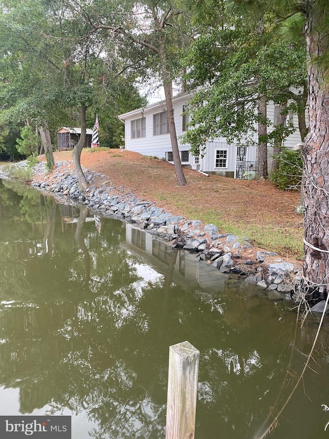 view of dock with a water view