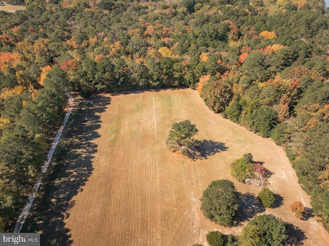 birds eye view of property with a rural view