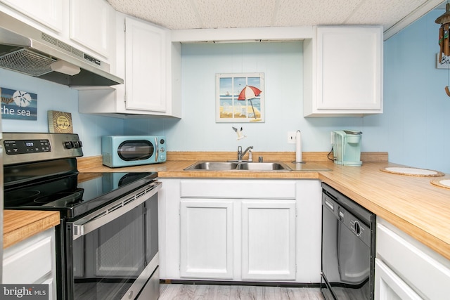 715 142nd St Unit 42304, Ocean City, MD 21842 - kitchen with white cabinets, stainless steel electric range oven, black dishwasher, under cabinet range hood, and a sink