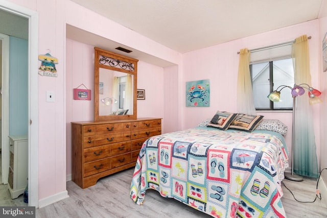 715 142nd St Unit 42304, Ocean City, MD 21842 - bedroom featuring visible vents and wood finished floors