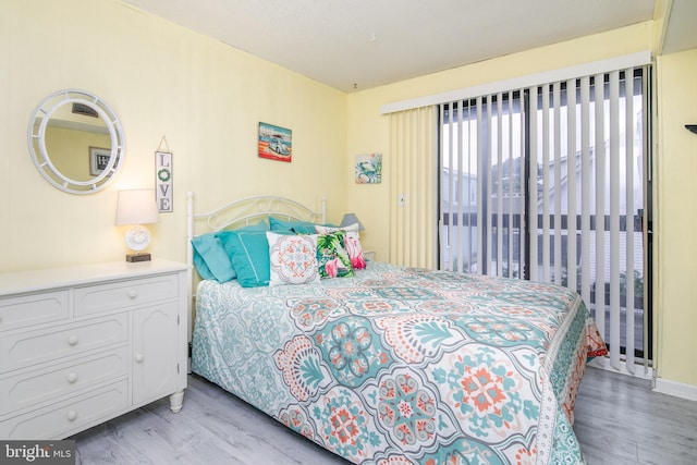 bedroom featuring light wood-type flooring