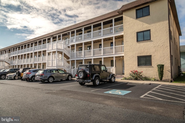 715 142nd St Unit 42304, Ocean City, MD 21842 - view of building exterior featuring uncovered parking