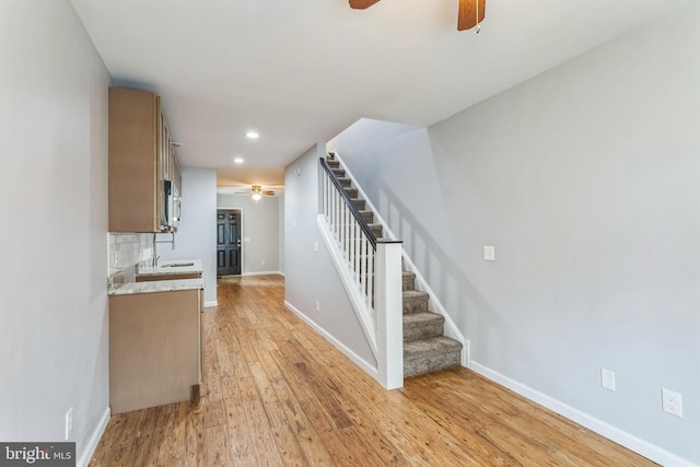 kitchen featuring light hardwood / wood-style floors and decorative backsplash