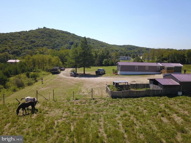 exterior space with a rural view