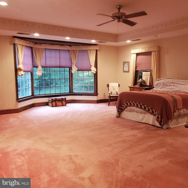 carpeted bedroom with ceiling fan