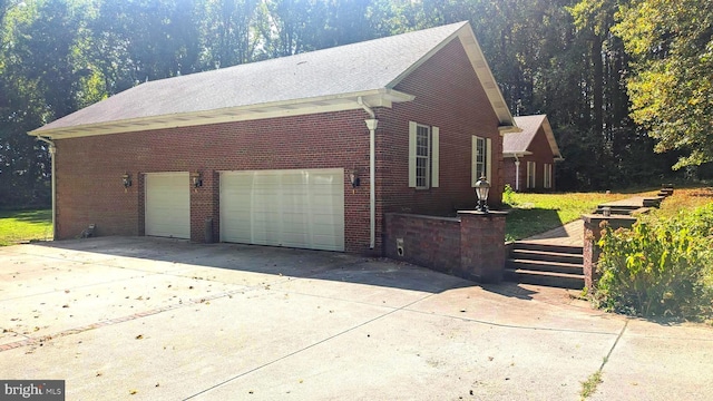 view of property exterior with a garage