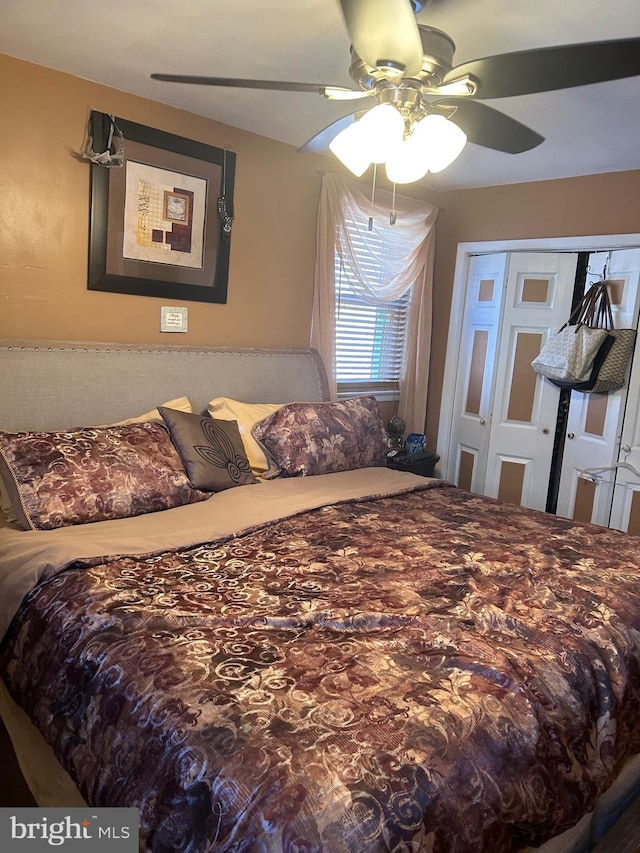 bedroom with a closet and ceiling fan