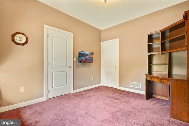 unfurnished bedroom with carpet floors