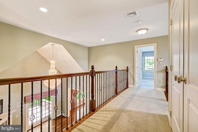 hallway featuring hardwood / wood-style flooring