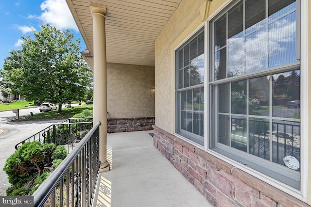 balcony featuring a porch