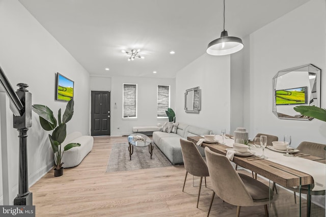 dining area featuring light wood-type flooring