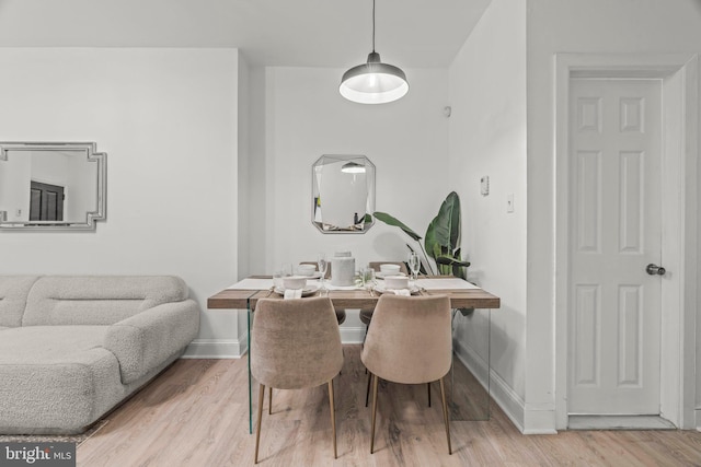 dining room featuring light hardwood / wood-style flooring