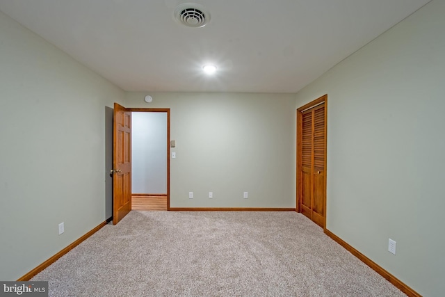 view of carpeted spare room